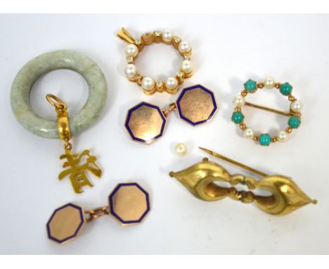 A pair of 9ct yellow gold and blue enamel cufflinks, two 9ct yellow gold framed brooches, a jade pendant and a Victorian broo