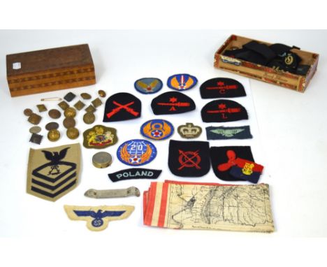 A quantity of military badges to include Naval badges, German badges and a Naval hat ribbon for the Schlachtschiff Scharnhors