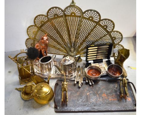 A quantity of metalware to include a three piece silver plated tea service with associated tray, a pair of silver plated and 