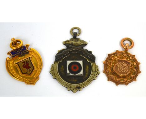 Three sporting medals to include a 9ct gold medal with enamel shield to the centre depicting a Liver Bird for the 'Liverpool 