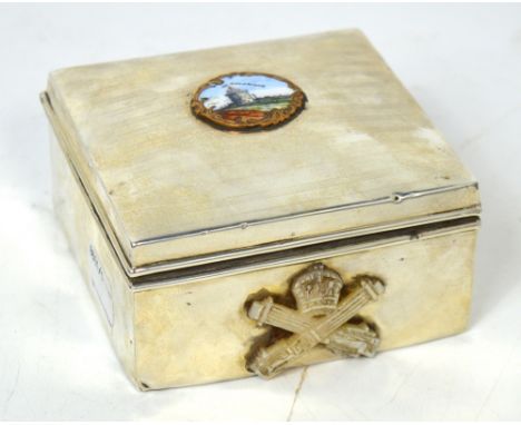 A George V hallmarked silver cigarette box mounted to the front with a mother of pearl Machine Gun Corps badge, traditionally