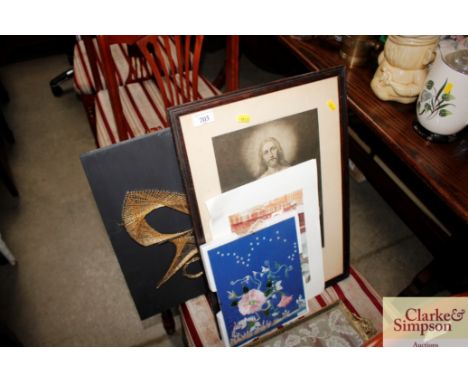 A dressing tray; a religious print and various other pictures 