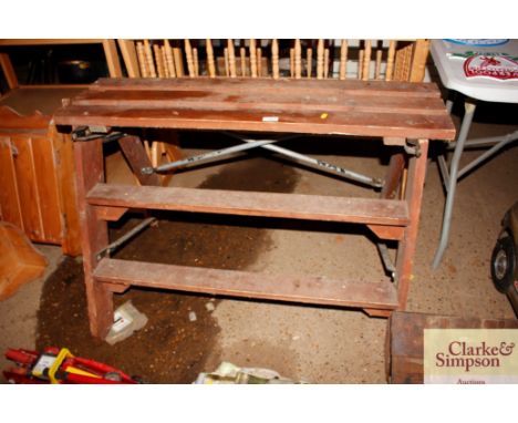 A wooden metal folding bench