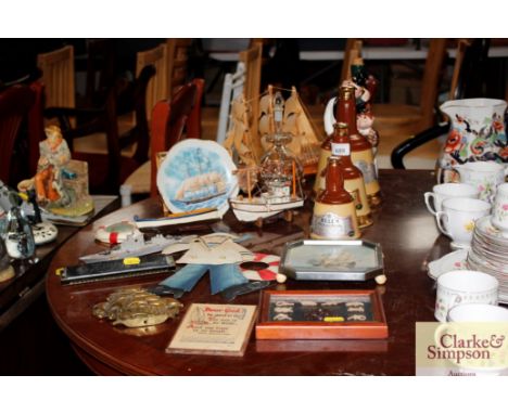 A collection of model boats; a Harmonica; Wade Bells whisky decanters etc.