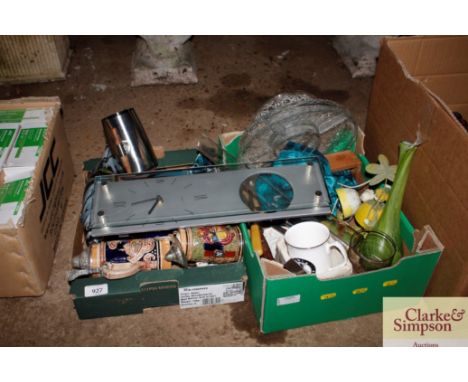 Two boxes containing various glass and china, wall clock, Poole pottery dolphin, coloured glass fish etc.  