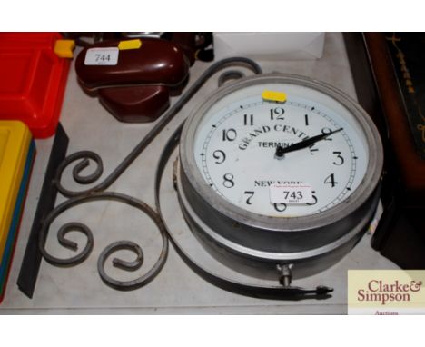 A metal wall clock decorated Grand Central Terminal New York 