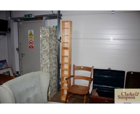 A narrow shelf unit