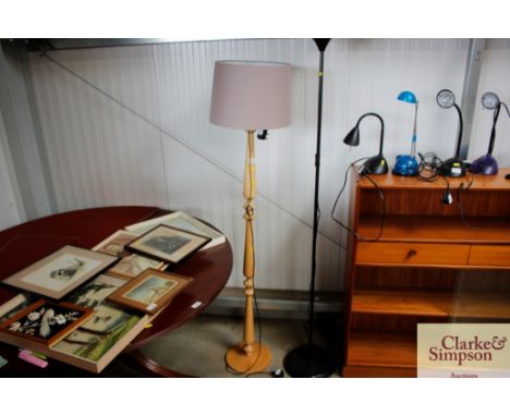 A standard lamp and shade