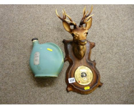 Vintage Eau de Cologne 'Johann Maria Farina' and a stag wall barometer