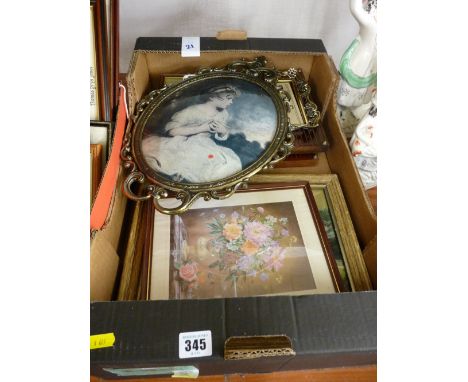 Metallic scrolled oval portrait frame and other prints