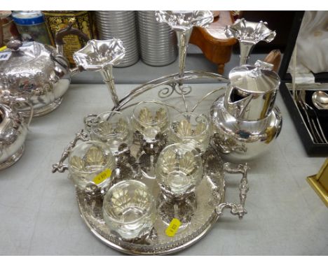 Small circular galleried electroplate tray with goblets, electroplate water jug and an epergne