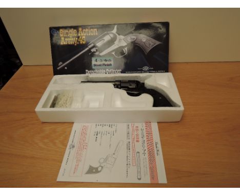 A Japanese Tanaka Colt Single Action Army 45 Air Soft Pistol, BB.177, in card box, purchaser must be over the age of 18
