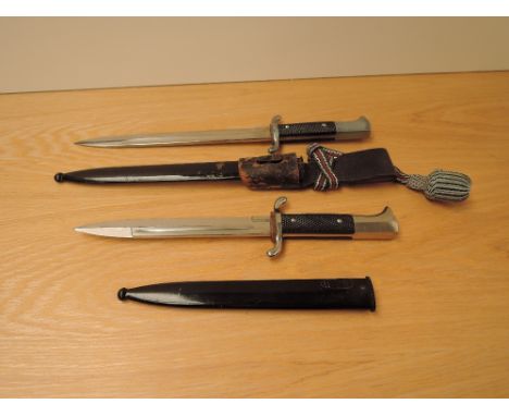 A WWII period German Fire Police Dress Dagger marked Horst Wolff GMBH Leipzig C1, blade scabbard 24cm, overall length 37cm wi