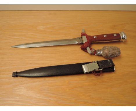 A WWII Period Swiss Superior Officer M43 Dagger having wood grip, with metal scabbard and portepee knot, blade length 21cm, o