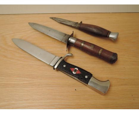 A German WWII Hitler Youth Dagger, blade marked Made in Solingen, blade length 14cm, overall length 24cm along with two hunti