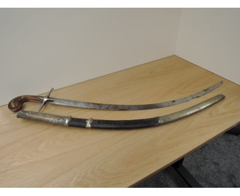 An early 19th century Persian Sword, Mameluke style, horn handle, metal crossguard, single edged curved blade, rusting to bla