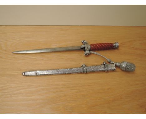 A German Third Reich Officers Dress Dagger by WKC Solingen, metal scabbard, portepee knot, blade length 26cm, overall length 