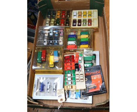 130+ Herpa HO scale plastic model vehicles. Mercedes, Volkswagen, Ford, Audi, Opel, etc. Some are 3 model sets. Many are in p