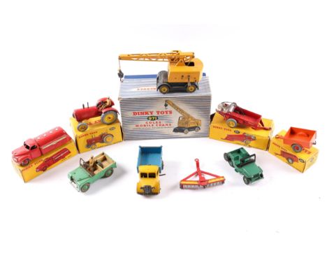 9 Dinky Toys. 5 boxed- Coles Mobile Crane 971, Massey Harris Tractor 300, Massey Harris Manure Spreader 321, an ESSO Tanker 4