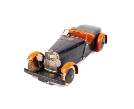 A scarce 1930's No.1 Meccano Constructor Car. An example made as an open 2 seat tourer. In black with red seats and mudguards