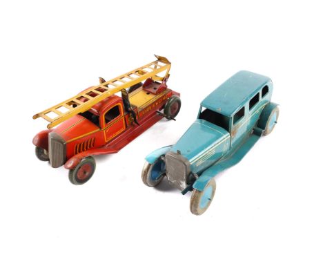 A 1930s  tinplate clockwork Fire Engine by WELLS, finished in red with yellow ladder, 2 pressed tin Fireman figures, and a fi