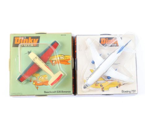 2 Dinky Toys aircraft. Beechcraft S35 Bonanza (710). An example in red, white and blue. Plus a Boeing 737 (717) in white and 