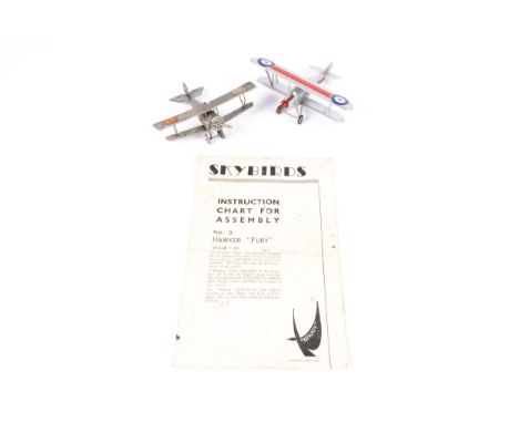 2 assembled Skybirds Aircraft. No. 3 Hawker Fury. In R.A.F. silver livery. Together with a second Bi-plane equipped with a ra