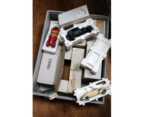 11 Franklin Mint vintage car models. Includes Rolls Royce Silver Ghost, Jaguar SS-100, Bugatti 575C Coupe, Stutz Black Hawk, 