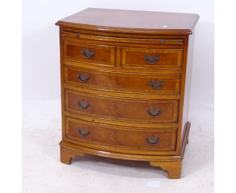 A reproduction yew wood bow-front chest, with brushing slide, 2 short and 3 long drawers under, on bracket feet, W58cm, H67cm