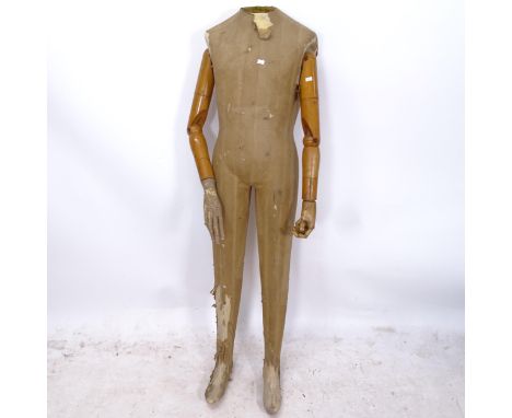 A Vintage French shop mannequin with poseable wooden arms, H150cm 