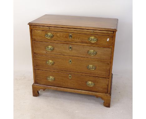 A George III mahogany bachelor's chest, with brushing slide and 4 long drawers under, on bracket feet, with key, W85cm, H84cm
