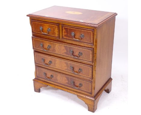 A mahogany crossbanded and satinwood-strung chest of small size, with 2 short and 3 long drawers, on bracket feet, W61cm, H72