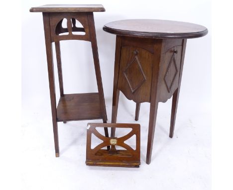 An Arts and Crafts oak jardiniere stand, a 1920s book rest, and an Arts and Crafts oak lamp table with 4 panelled fall-fronts