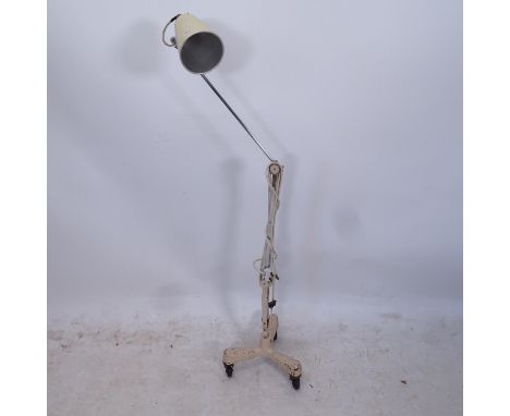 An early 20th century floor standing medical lamp, by Hinders Ltd of London, tallest height 148cm 