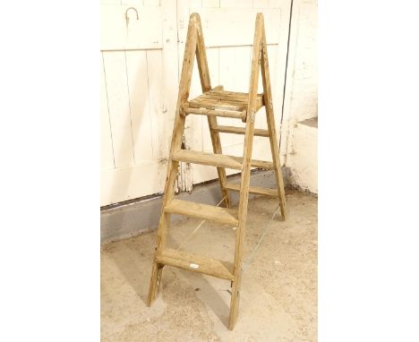 A Vintage pine double-sided step ladder 