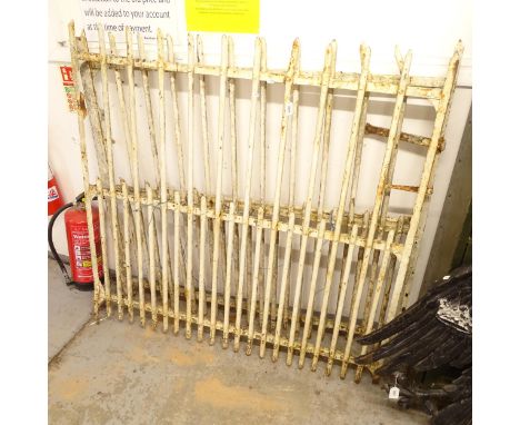 A pair of white painted cast-iron riveted drive gates, from Arras, France, each gate L133cm, H127cm 