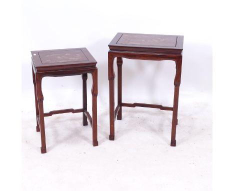 A graduated pair of Oriental hardwood lamp tables, with silvered inlaid decoration, widest 42cm 