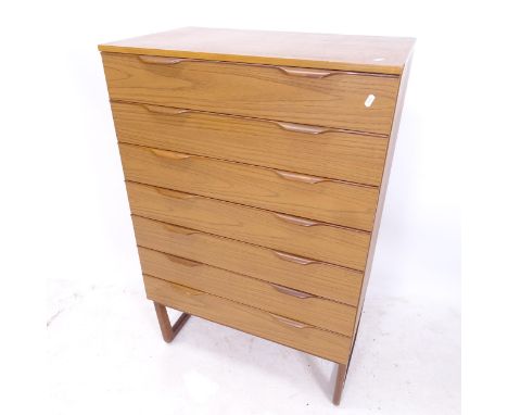 A teak mid-century chest of 7 drawers, on sled legs, W76cm, H119cm, D45cm 