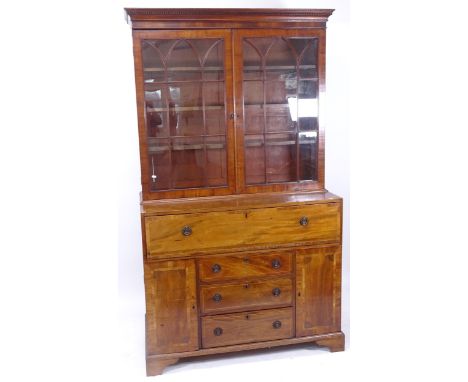 A 19th century mahogany 2-section secretaire bookcase, the lower section having a fall-front drawer with fitted interior, and