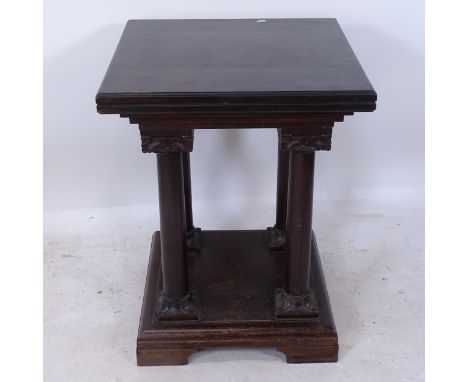 An Antique oak square display stand, with quadruple turned columns, on a platform base with bracket feet, W58cm, H75cm 