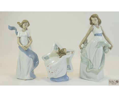 Nao by Lladro Figures ( 3 ) Comprises 1/ Walking on Air. Issued 2000, Model No 1343, Sculptor Rafael Lozano. 10.5 Inches High