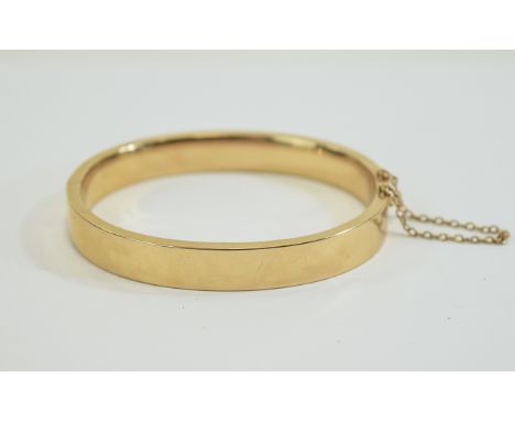 Victorian 15ct Rose Gold Hinged Bangle with Attached 15ct Gold Safety Chain. Marked 15 ct. 16.1 grams. 
