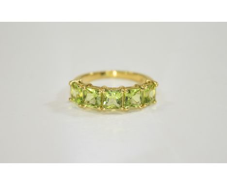 Peridot Five Stone Band Ring, 3.5cts of square cut peridots set as a single row across the front of the finger, half eternity