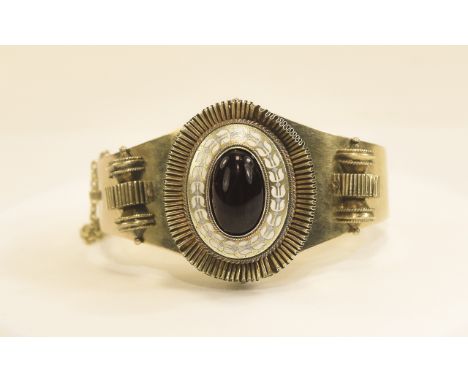 Victorian - Early 15ct Gold Child's Stone Set Hinged Bangle, Set with a Central Oval Shaped Cabochon Cut Quality Garnet. Wond