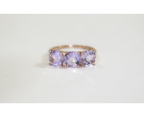 Rose de France Amethyst Three Stone Ring, three cushion cut Rose de France amethysts totalling 4cts, set across the finger, i