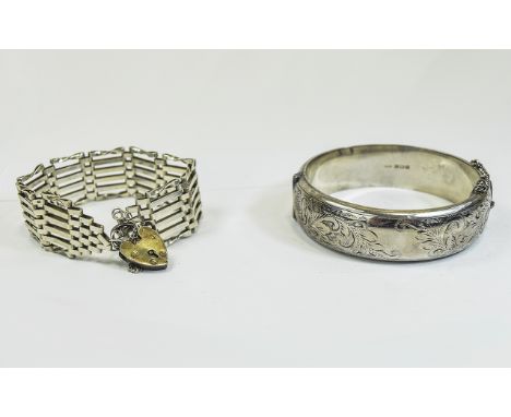 Silver Hinged Bangle with Stylish Floral Decoration. Hallmarked for Birmingham 1963, 41.2 grams + a Silver Six Bar Gate Brace