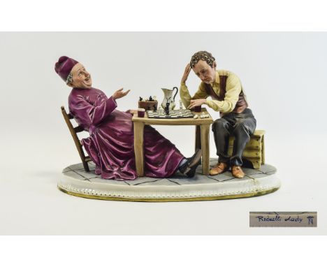 Large Capodimonte Figurine Signed to base 'Redaelli Lady'  Features an Italian Cardinal playing chess with companion. Approx 