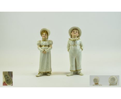 Royal Worcester Hand Painted and Fine Pair of Figural Casters, In The Form of a Young Boy and Girl In Victorian Dress. Printe
