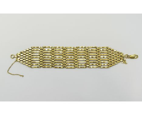 Ladies 9ct Gold Nine Bar Gate Bracelet. c.1980's. Fully Hallmarked, 9.375. Excellent Condition. 27.2 grams. 1.25 Inches Wide 