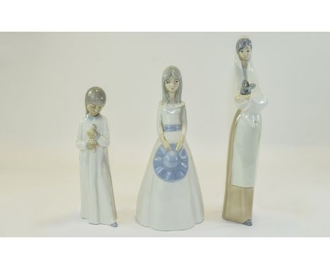 Nao by Lladro Figures ( 3 ) Comprises 1/ Girl with Puppy. 8 Inches Tall. 2/ Lady Holding a Rabbit. 11 Inches Tall. 3/ Girl In